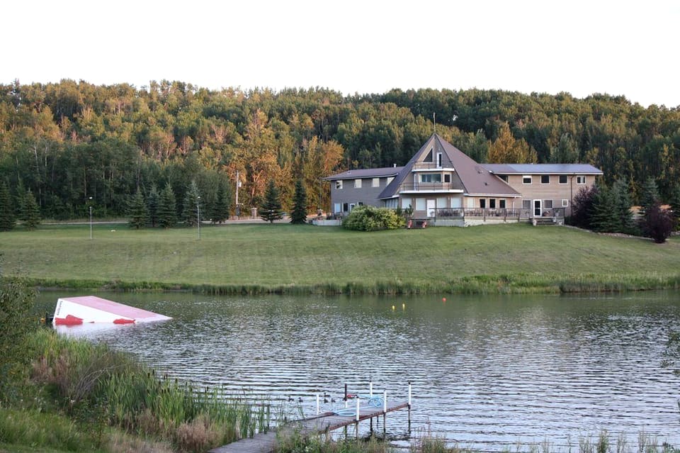 The Shalom Park clubhouse beside the lake