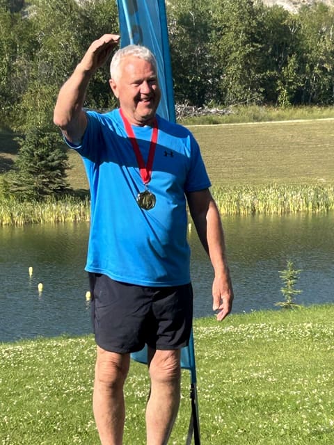 Ken Nelson on the podium